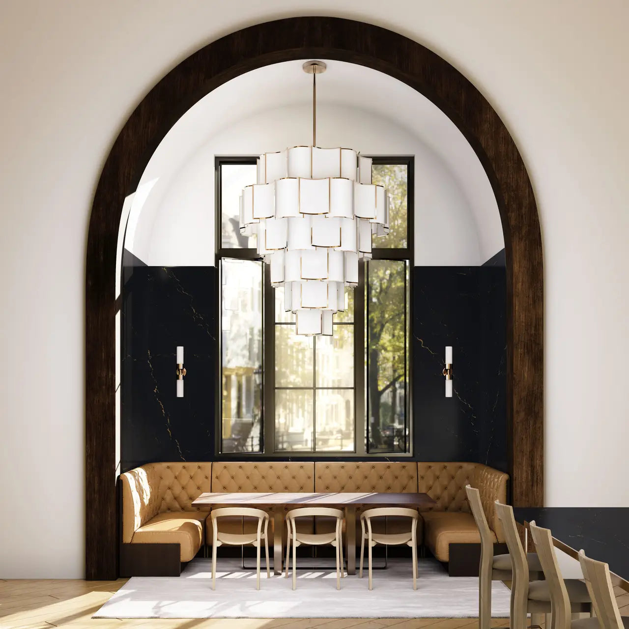 Marble banquette seating with dark veining and polished finish in arched dining nook — custom countertops fabricated and installed by Signature Stone LV
