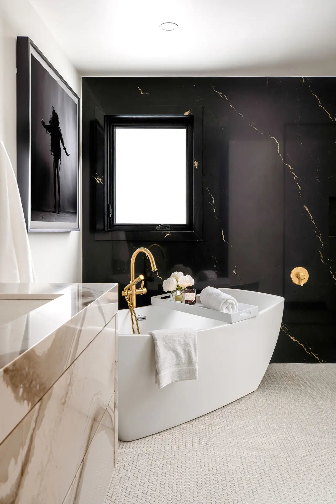 Marble bathroom vanity with white veined surface and polished finish — elegant stone countertops installed by Signature Stone Las Vegas