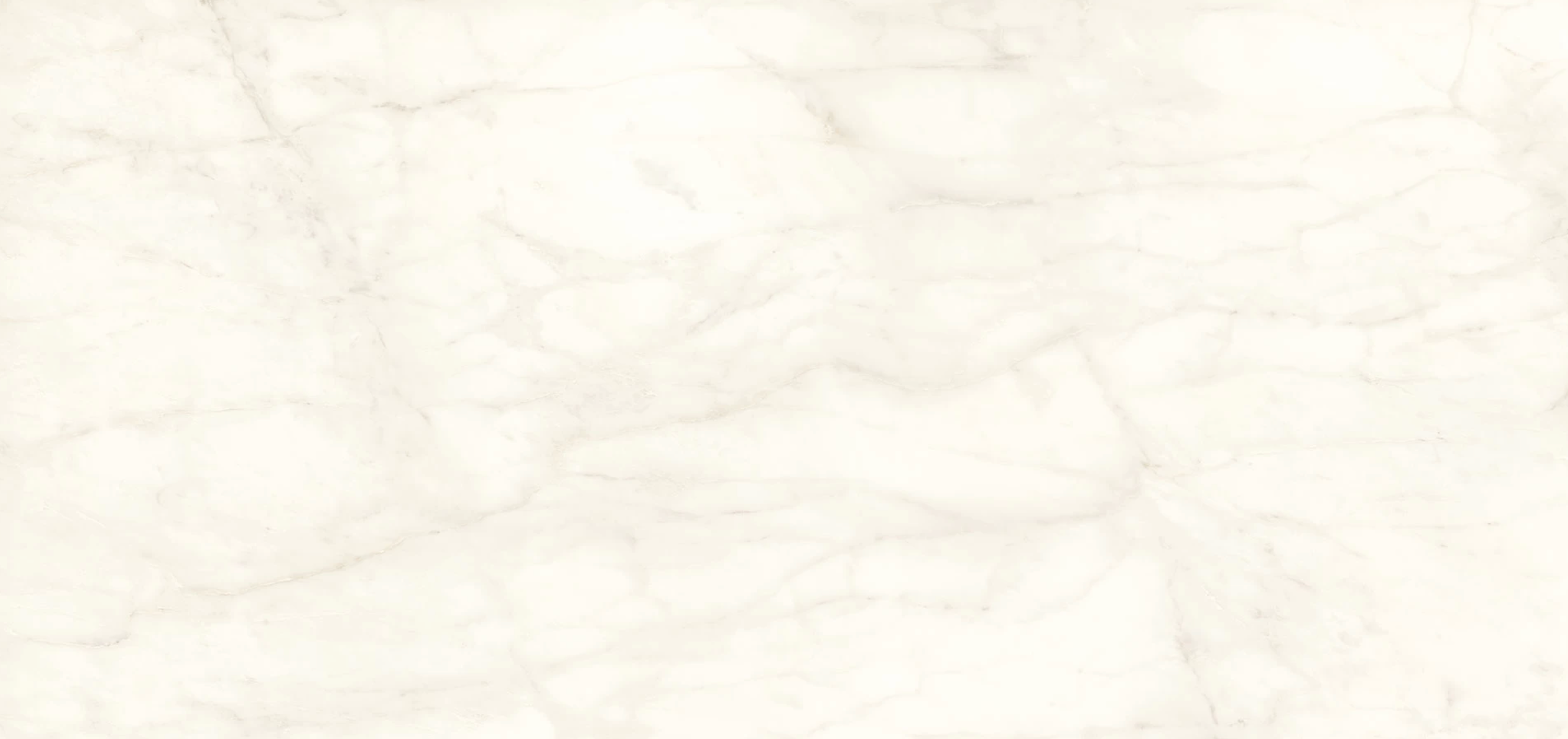 Calacatta Delicato marble kitchen island with white base and gray veining, polished finish — custom countertops fabricated and installed by Signature Stone LV
