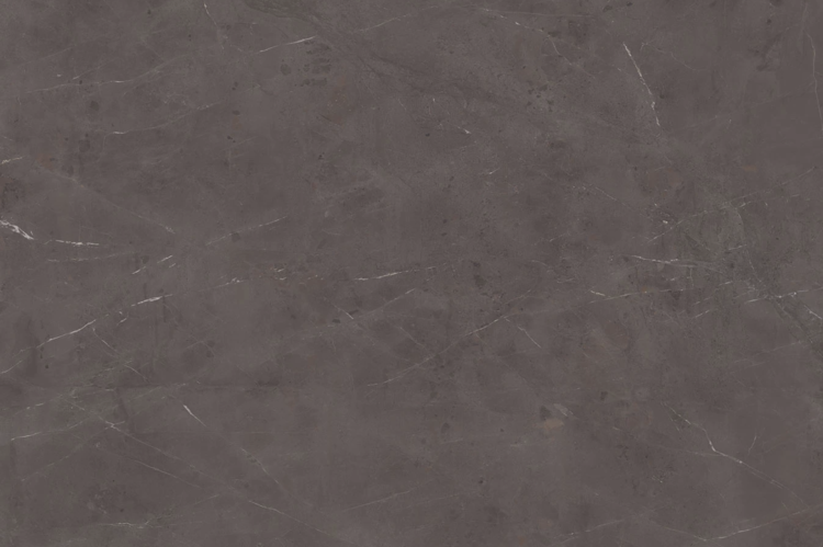 Dark gray marble surface with subtle white and brown veining, featuring natural texture and patterns typical of stone from Signature Stone Las Vegas, ideal for elegant and sophisticated bathroom countertops.